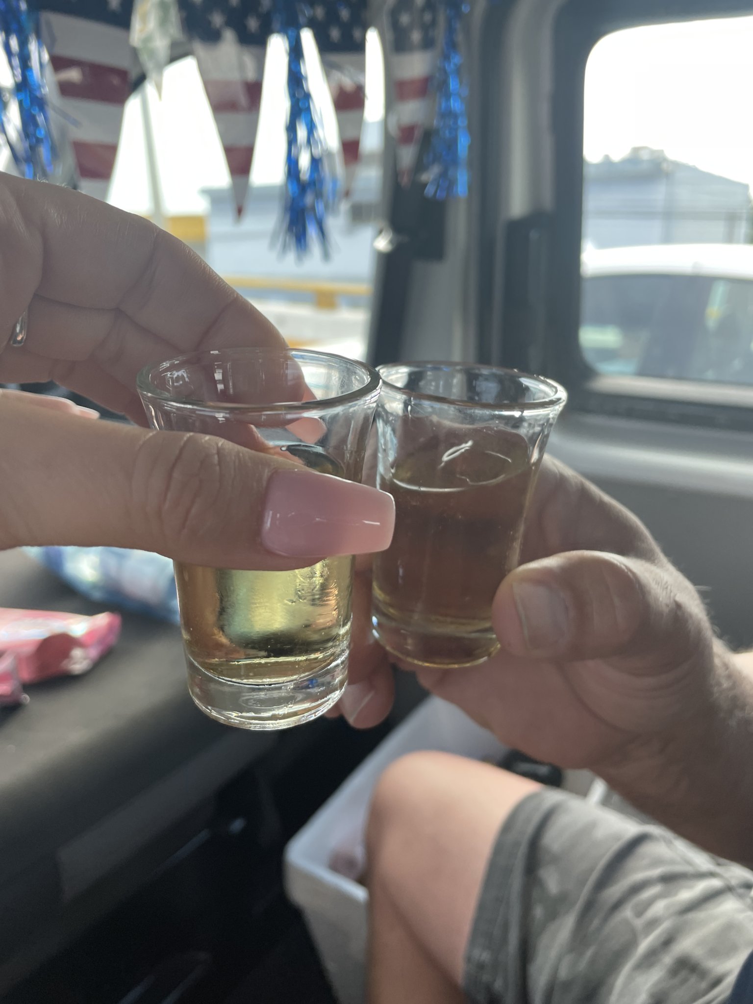 Tequila package celebration inside the USA Transfers van