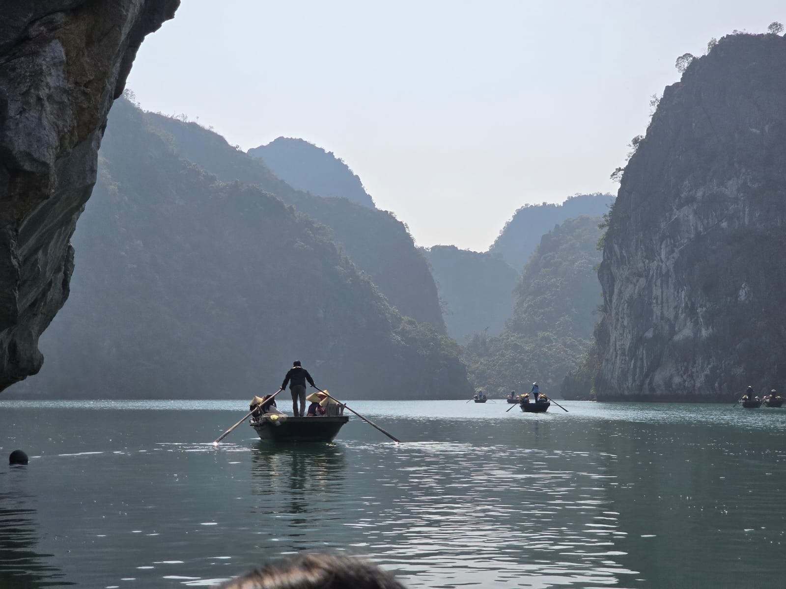A traditional bamboo boat on the water in Ha Long Bay