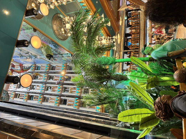 The ship's atrium, with chandeliers and well-stocked bars