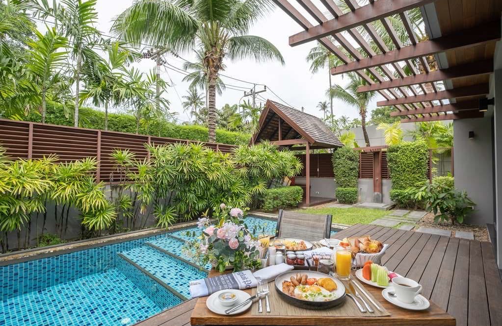 Standalone pool villa at Anantara Mai Khao Phuket Villas, with a private pool on level ground beside the lagoon