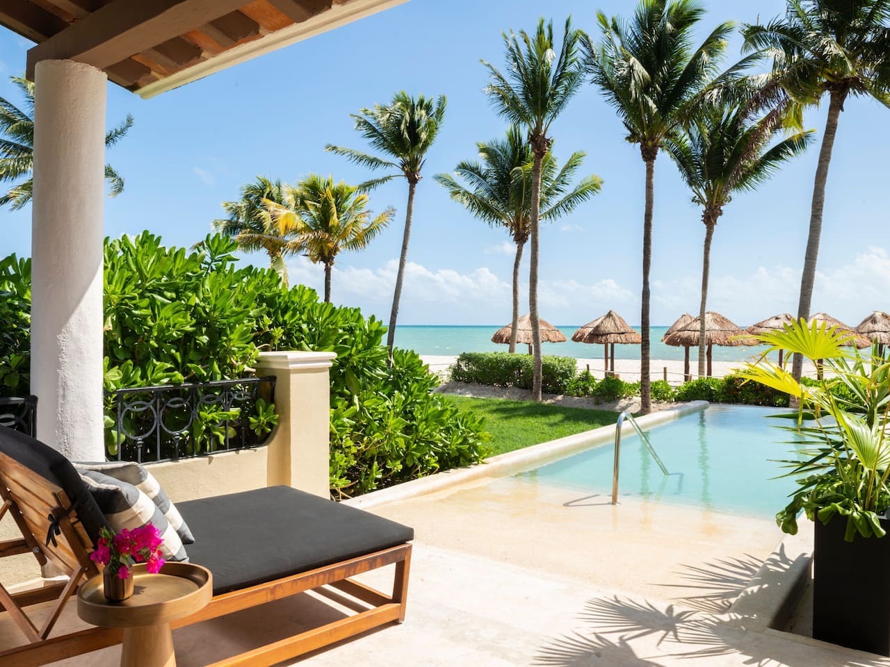 Private plunge pool off a suite terrace at Hyatt Zilara Riviera Maya, with the beach and palapas beyond